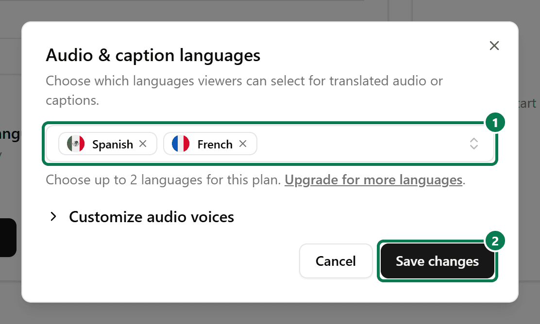 Close-up of Audio and caption languages with Spanish and French selected, highlighting the language selector as 1 and Save changes as 2.